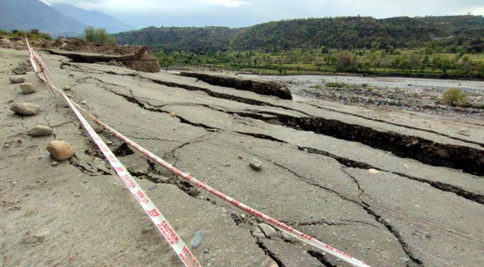Sula Park-Baradhari Road in Reasi district damaged due to continuous rainfall on Saturday. — Excelsior/Romesh Mengi