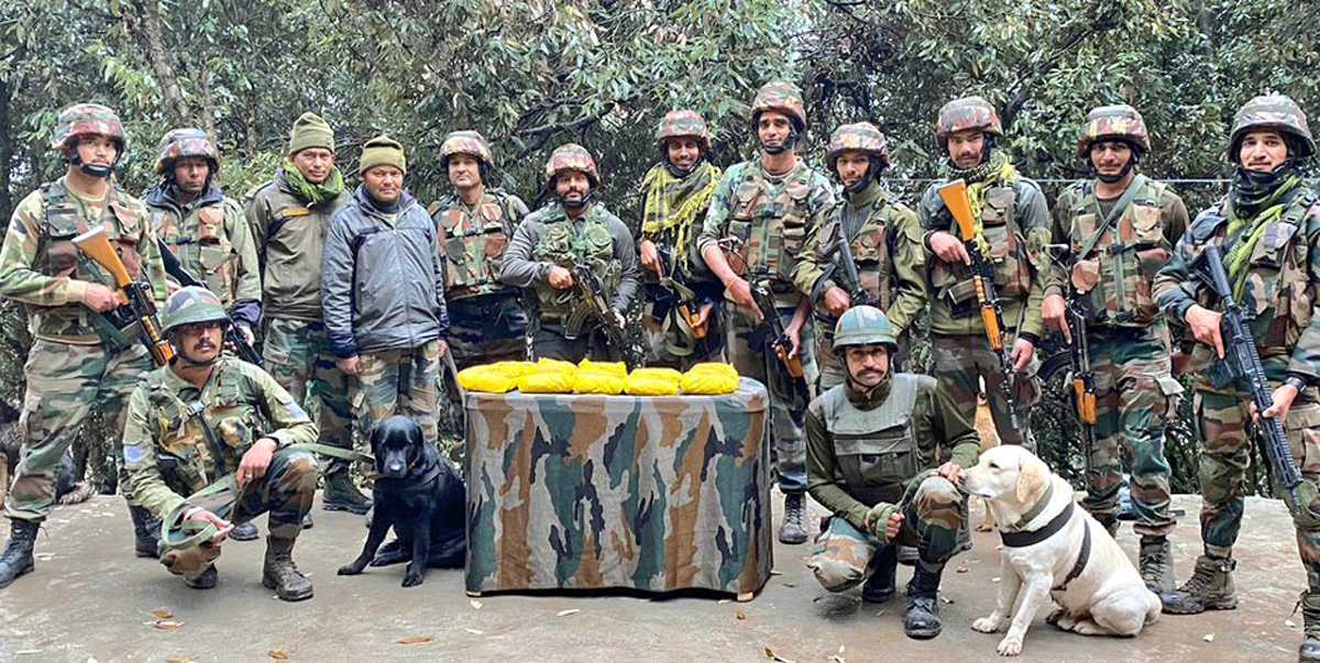 Ten packets of narcotics recovered by Army from LoC area in Poonch on Friday. - Excelsior/ Waseem