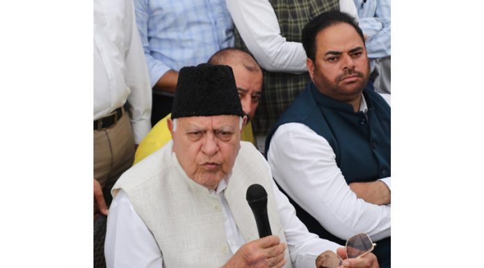 NC president Dr Farooq Abdullah speaking to reporters after meeting in Jammu on Saturday. - Exclesior/Rakesh