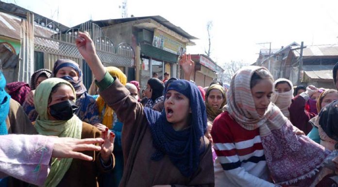 Women protest in Soibugh area of Budgam against woman’s murder. -Excelsior/Shakeel