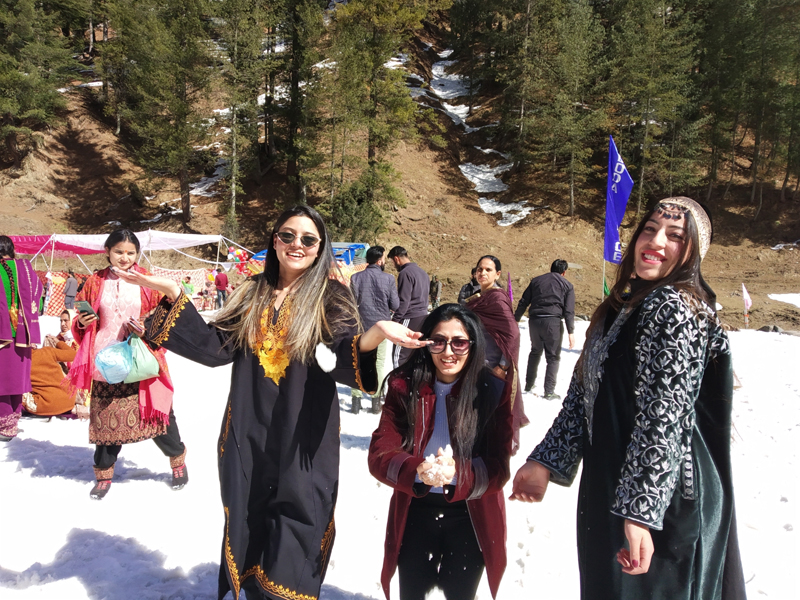 As mercury starts soaring in the plains, tourists enjoying at snow filled Jaie meadow of Bhaderwah on Friday. — Excelsior/Tilak Raj