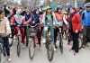Principal GMC Srinagar along with other doctors flagging off a cycling event in Srinagar on Sunday. -Excelsior/Shakeel