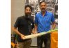 Cricketer Hardeep Singh presenting bat to Rajesh Gill in a function at Jammu on Wednesday.