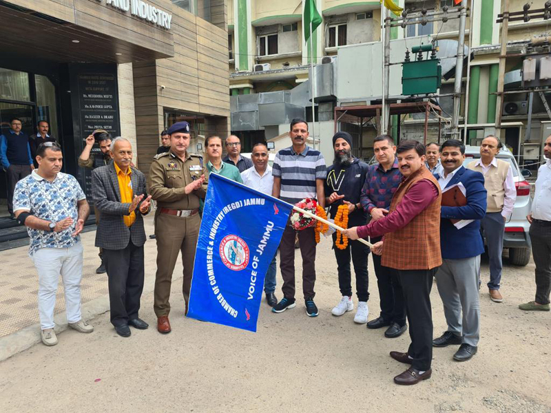 CCI president Arun Gupta flagging off Rajesh Gill for participation in the Legends world cup from Jammu on Thursday.