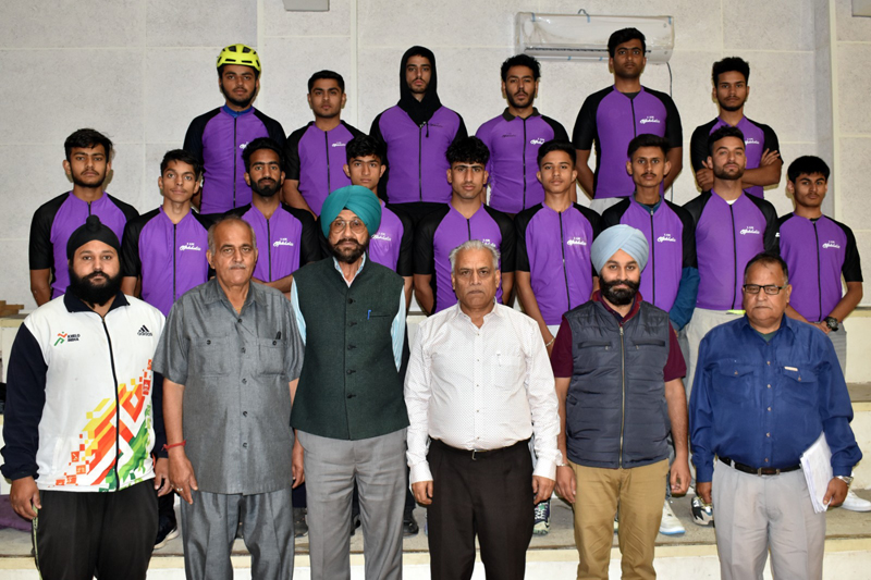 Team posing with Divisional Sports Officer Ashok Singh at MA Stadium on Saturday.
