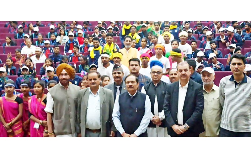 Advisor to Lieutenant Governor, Rajeev Rai Bhatnagar posing for a group photograph after inaugurating Tribal Youth Exchange Programme at Teachers Bhawan in Jammu on Tuesday.