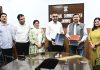 Chairman of SSKSB Ramesh Kumar displaying an MoU after signing at Jammu on Wednesday.