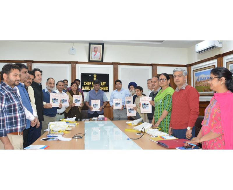 Chief Secretary and other officers releasing Economic Survey.