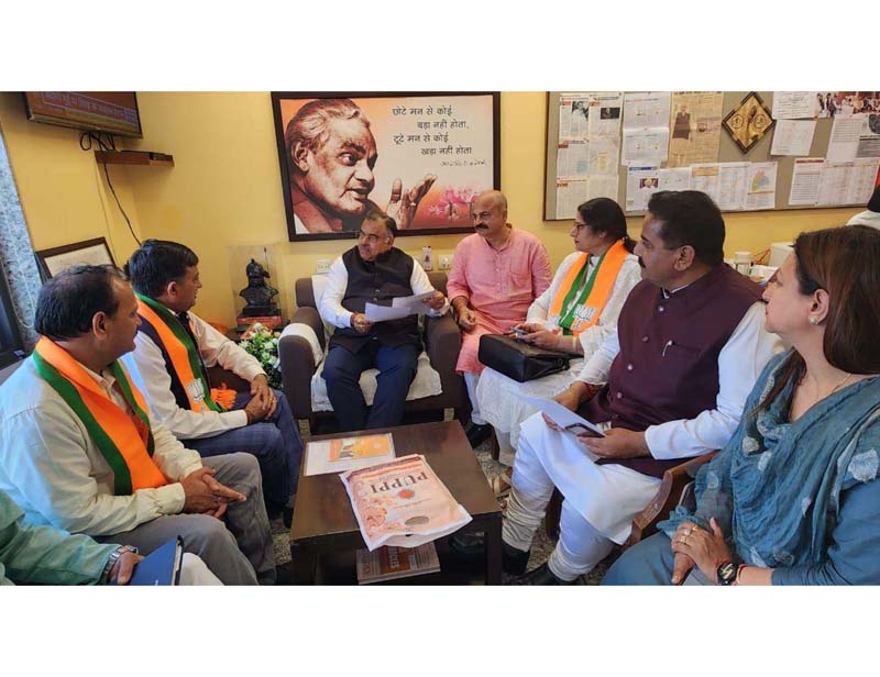 Senior BJP leaders from J&K during a meeting with party national general secretary, Tarun Chugh at New Delhi on Tuesday.