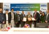 Officers of J&K Bank and Bajaj Allianz during signing of an agreement at Bank's corporate headquarters in Srinagar.