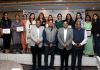Women achievers awarded by ASSOCHAM along with other dignitaries posing for a group photograph in Jammu on Friday.