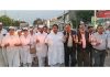 Cong leaders and Sewa Dal activists taking out candle light march in support of Rahul Gandhi in Jammu.