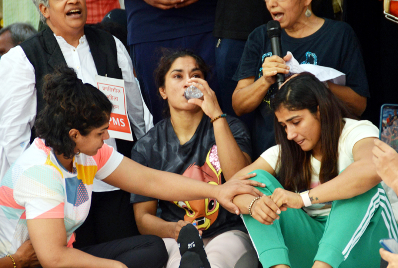 Wrestlers Vinesh Phogat, Sakshi Malik and others staging a protest over