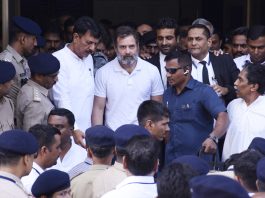 Congress leader Rahul Gandhi coming out of the court after appearing before the Magistrate on a defamation case against him, in Surat on Monday. (UNI)