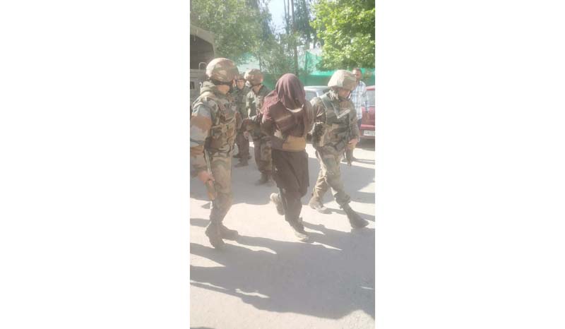 An intruder captured by LoC troops in Poonch being taken to hospital on Sunday.