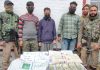 Narco smugglers in police custody with consignment.