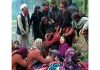 Wailing family members near dead bodies of their dear ones, in Kishtwar area on Thursday.
