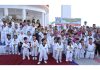 Winners of various events of Inter-school Open Taekwondo Championship posing with guests.