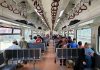 Passengers aboard the Srinagar-Baramulla train, enjoying a scenic journey. -Excelsior/Aabid Nabi
