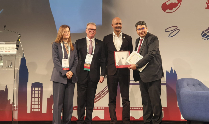 A representative of ‘VKC Nuts’ receiving award at INC Annual Meet held recently in London.