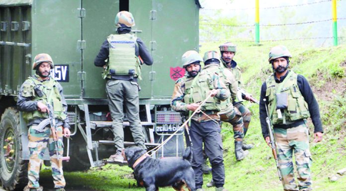 Army jawans at the encounter site at Anderwan Sagam area of Anantnag district on Sunday. (UNI)