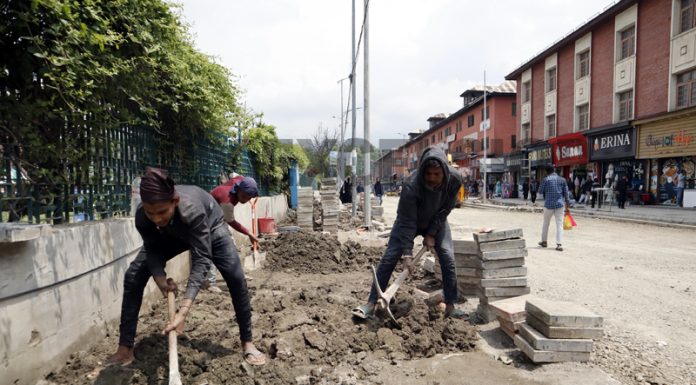 Restoration works underway in Srinagar as part of Smart City project. -Excelsior/Shakeel