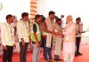 Prime Minister Narendra Modi felicitates Shramjeevis for their great contribution in new Parliament building construction, in New Delhi on Sunday. (UNI)