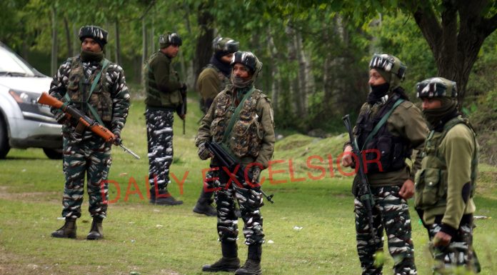 Security forces during encounter in Kunzar area of Baramulla. — Excelsior/Aabid Nabi