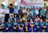 Players and others pose for a group photograph at the culmination of 1st all India Women Cricket Championship 2023 in Doda. -Excelsior/Tilak Raj