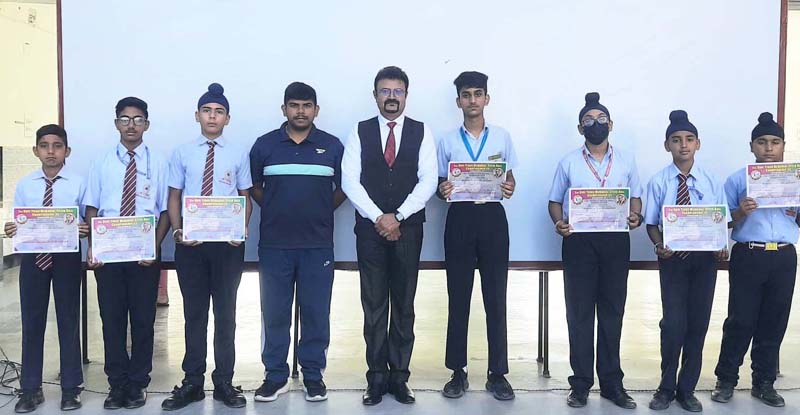 Speedball team of Shaurya International School posing with Principal Rajesh Gandral at Jammu on Monday.