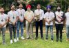 Gold medal winners of Roller Skating senior team posing with Association president GS Khurmi at Jammu on Friday.