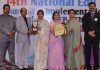 Principal, APS Sunjuwan, Dinesh Verma receiving 'Most Popular School Leader Award'.