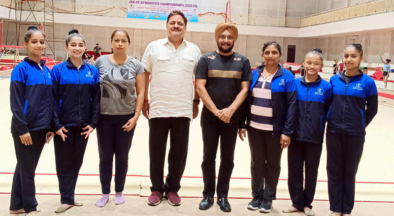 President, Gymnastics Association of J&K, Kiran Wattal posing with selected gymnasts and their coaches.