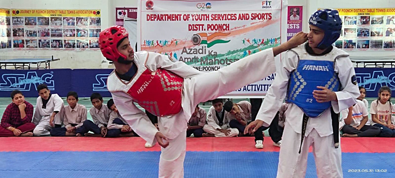 Players vying for medal during Inter-school Taekwondo Championship that commenced at Sports Stadium Poonch on Wednesday.