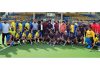 Players posing for a group photograph at KK Hakku Stadium Jammu on Wednesday.