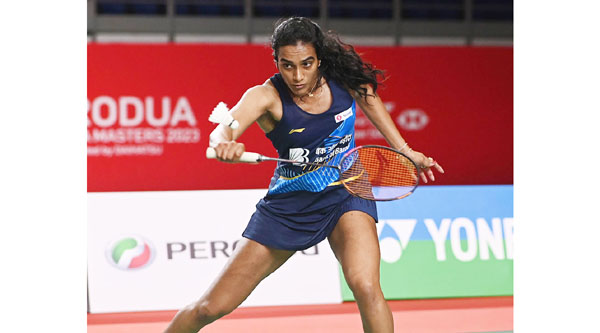 Pusarla V. Sindhu competes during the women's singles quarterfinal match against China's Zhang Yiman at Malaysia Masters 2023 in Kuala Lumpur. (UNI)