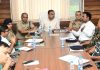 Div Com Jammu chairing a meeting.