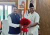 MP (RS), Gulam Ali Khatana presenting a bouquet to Minister of State for Tourism and Defence Ajay Bhatt at New Delhi on Friday.