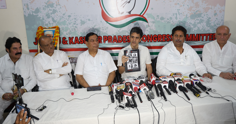 Senior AICC leader Amitabh Dubey flanked by others addressing press conference in Jammu on Saturday. -Excelsior/Rakesh