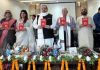 Senior BJP leader Devender Singh Rana and others releasing a book on Saturday.
