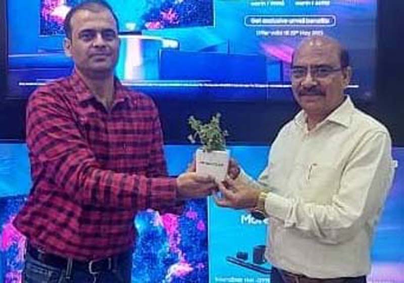 Proprietor of RK Video Jammu Vijay Sharma along with a Samsung official at the former’s store in Jammu.