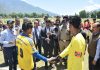 Captains shaking hands during inaugural ceremony of CVPPL Kishtwar Football Cup being inaugurated by DC Kishtwar, Dr. Devansh Yadav on Sunday. - Excelsior/Tilak Raj