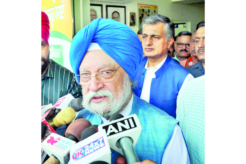 Union Minister Hardeep Singh Puri speaking to media person in Jammu on Monday. -Excelsior/Rakesh