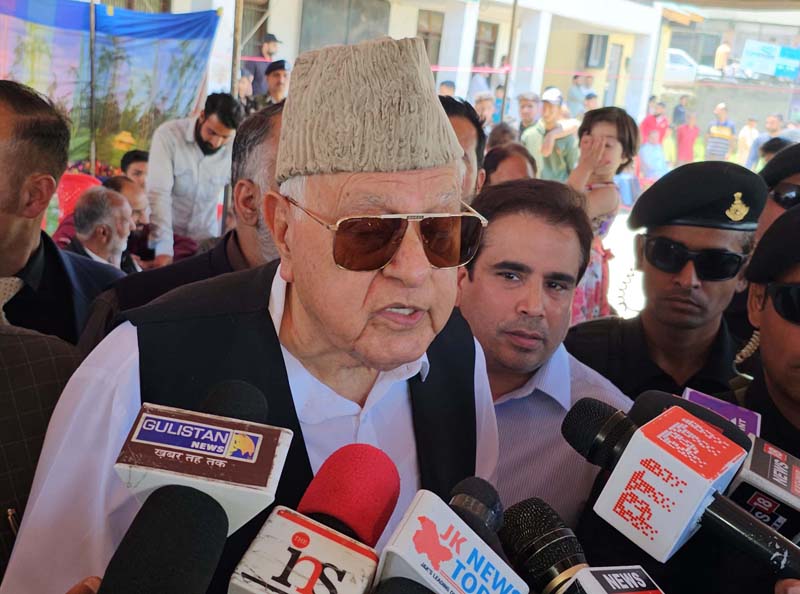 NC president Dr Farooq Abdullah speaking to reporters in Srinagar on Sunday. -Excelsior/Shakeel