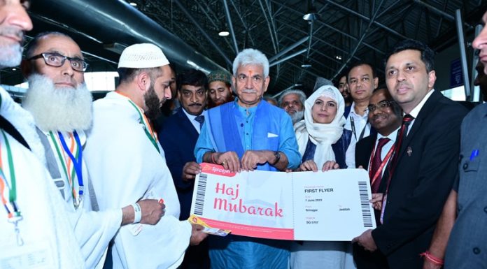 LG Manoj Sinha seeing off first batch of Haj pilgrims from Srinagar international airport on Wednesday.