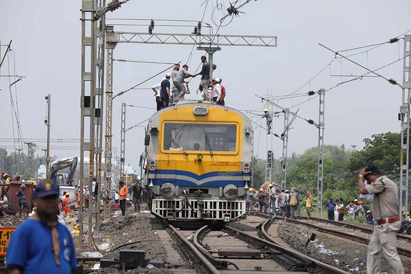 Restoration work underway at the site of accident involving three trains, near Bahanaga Bazar railway station in Balasore district on Sunday.