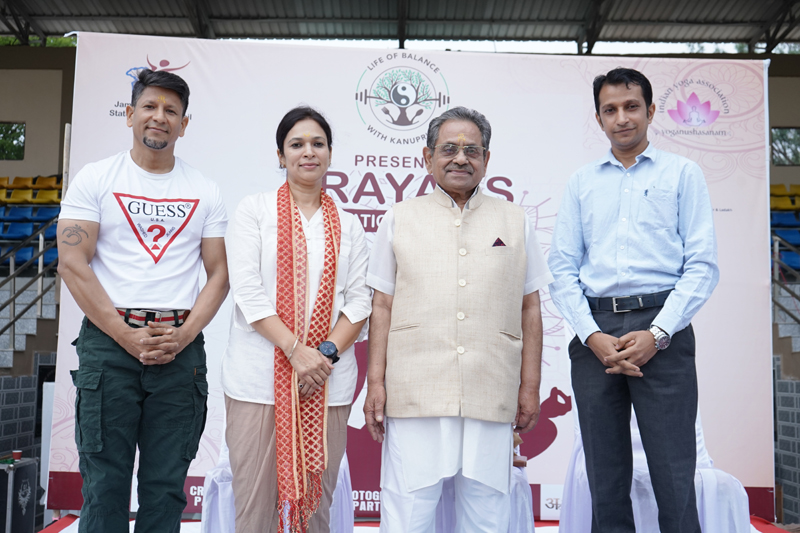 Dignitaries posing for group photograph during a yoga workshop in Jammu on Sunday.