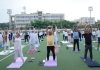 Participants performing yoga during a workshop organized by 'Life of Balance' in Jammu on Sunday.