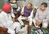 Ashish Sood and Jugal Kishore Sharma interacting with Captain Bana Singh at his residence in Jammu on Sunday.