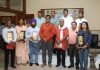 Journalists posing for a group photograph after receiving felicitation at a function in Jammu on Sunday.
